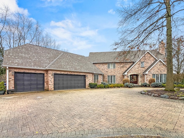 view of front of property with a garage