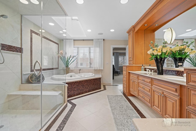 bathroom featuring vanity, tile patterned floors, and independent shower and bath