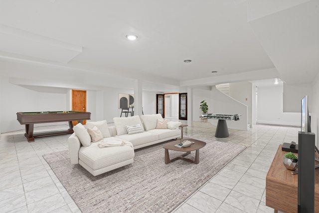 living room featuring pool table