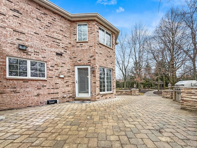 view of patio / terrace with area for grilling and an outdoor kitchen