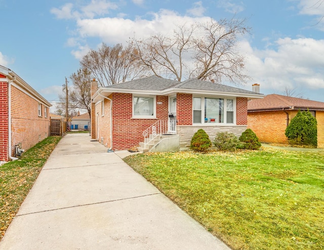 view of front of home with a front lawn