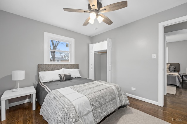 bedroom with ceiling fan and dark hardwood / wood-style flooring