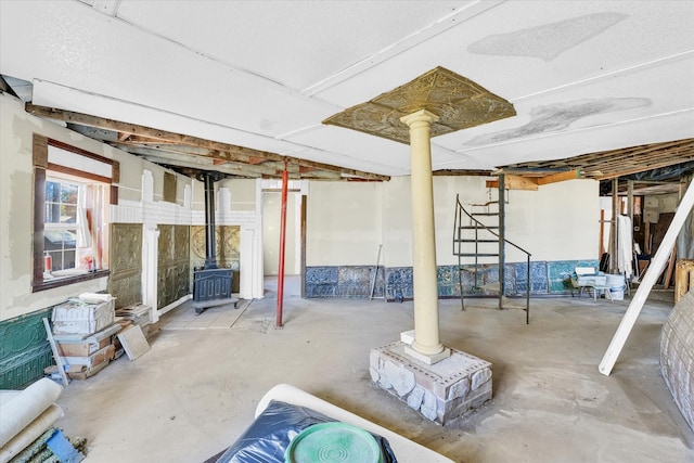 basement featuring a wood stove