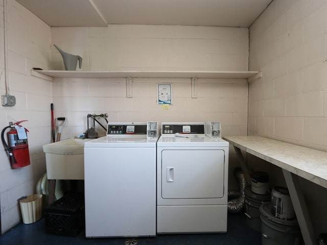 laundry room with washer and clothes dryer