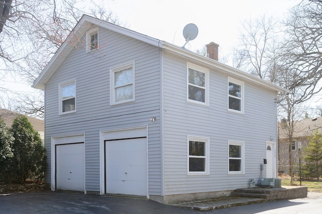 exterior space featuring a garage