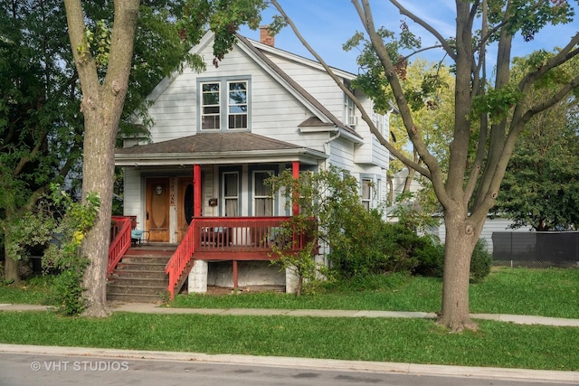 3545 Oak Ave, Brookfield, IL 60513 - bungalow with covered porch, a chimney, a front lawn, roof with shingles, and stairs