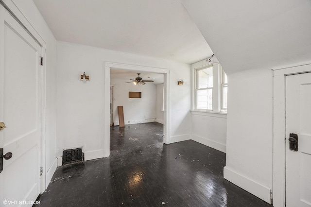 3545 Oak Ave, Brookfield, IL 60513 - unfurnished room with wood finished floors, visible vents, baseboards, and ceiling fan