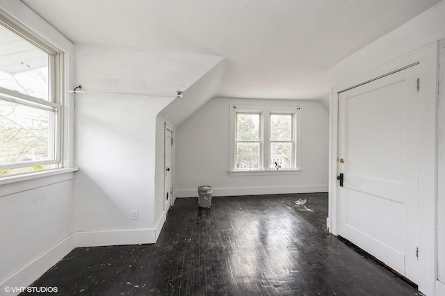 3545 Oak Ave, Brookfield, IL 60513 - additional living space with baseboards, wood finished floors, and vaulted ceiling
