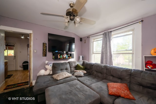 spare room featuring crown molding, a healthy amount of sunlight, and hardwood / wood-style flooring