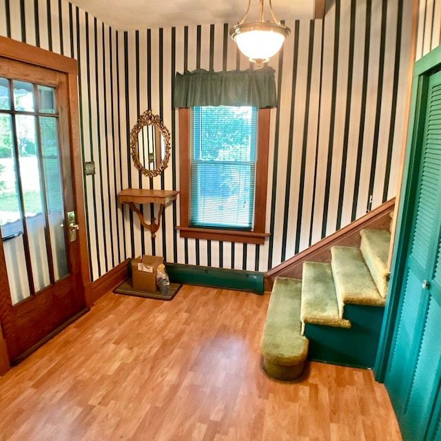 interior space with hardwood / wood-style flooring