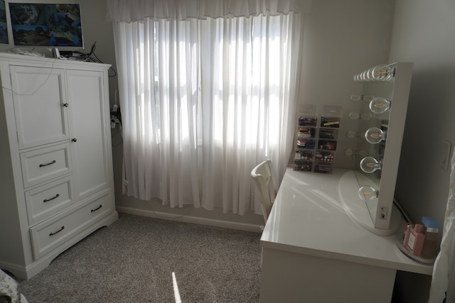 interior space featuring light colored carpet