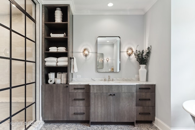 bathroom featuring vanity and crown molding