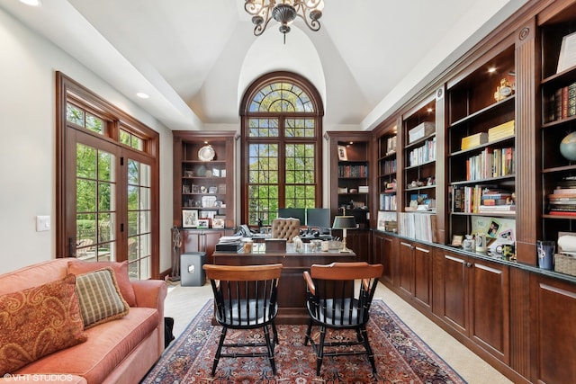 carpeted office space with a healthy amount of sunlight, vaulted ceiling, and a chandelier