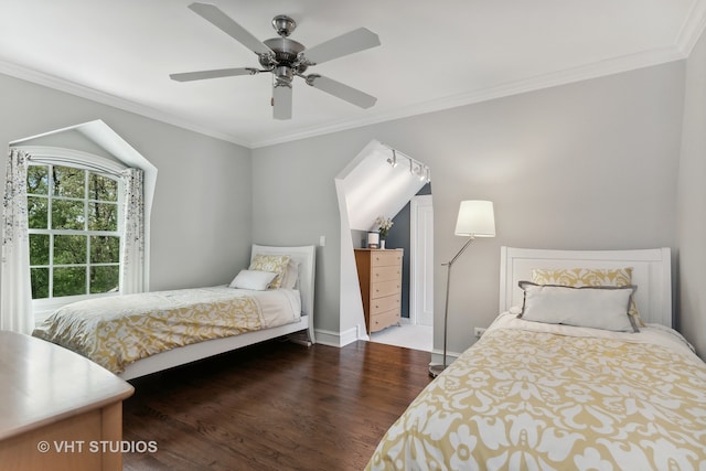 bedroom featuring dark hardwood / wood-style floors, crown molding, and ceiling fan