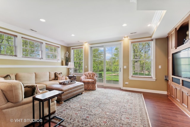 living room featuring ornamental molding and dark hardwood / wood-style flooring