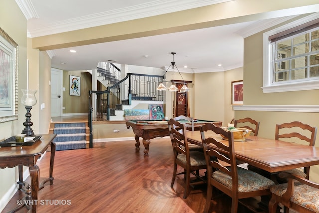 dining space with pool table, ornamental molding, and hardwood / wood-style flooring