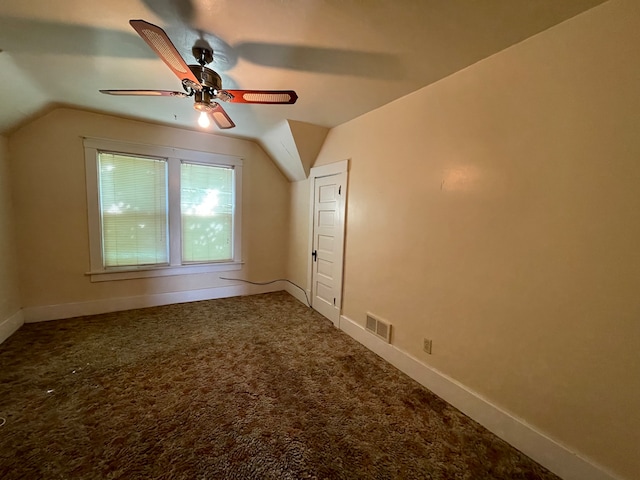 bonus room with carpet flooring, ceiling fan, and vaulted ceiling