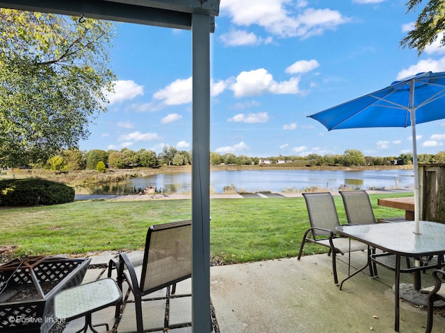 view of patio featuring a water view