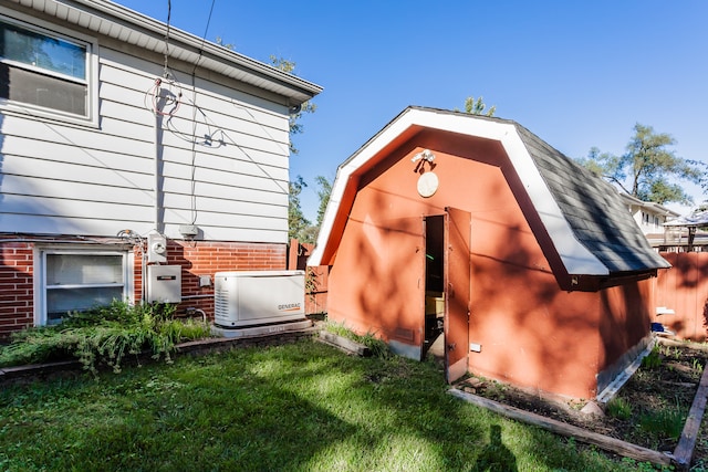 view of outdoor structure featuring a yard