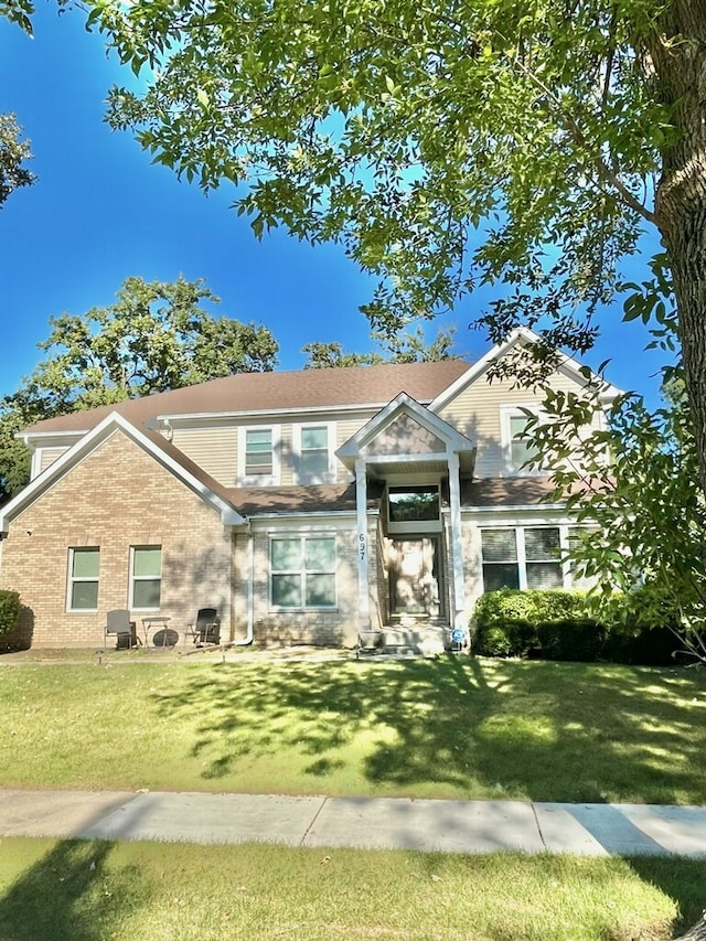 view of front facade with a front lawn