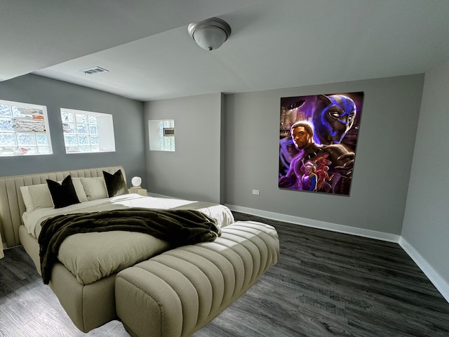 home theater room featuring dark hardwood / wood-style floors