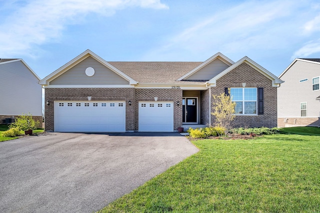 view of front of home with central AC unit, a front yard, and a garage