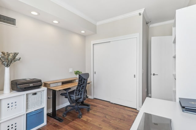 office area featuring ornamental molding and dark wood-type flooring