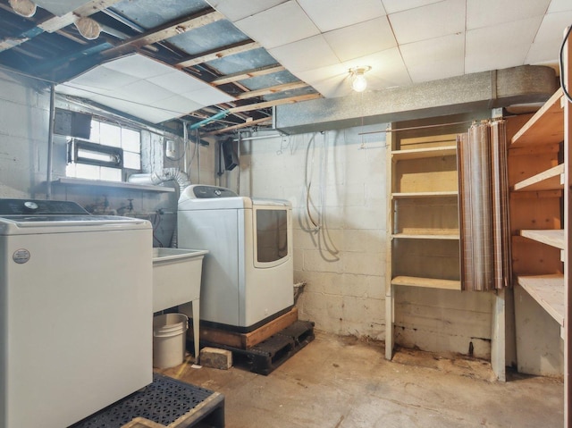 basement with separate washer and dryer