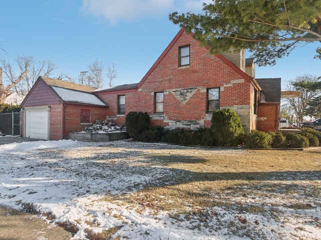 view of front of property with a lawn and a garage