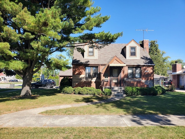 view of front of home with a front yard