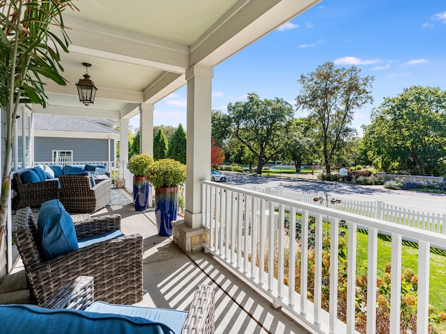 balcony featuring a porch