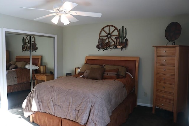 bedroom featuring ceiling fan and a closet