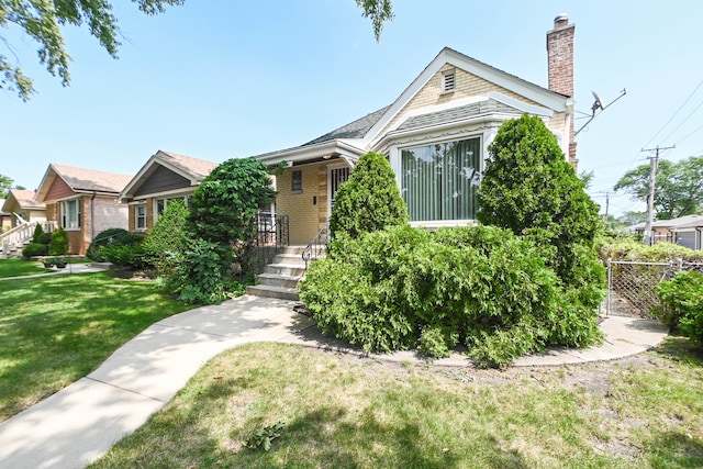 view of front of property with a front lawn