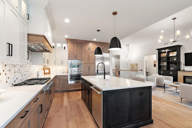 11060 Lizmore Ln Unit 27B, Orland Park, IL 60467 - kitchen featuring stainless steel appliances, a sink, light wood finished floors, glass insert cabinets, and tasteful backsplash