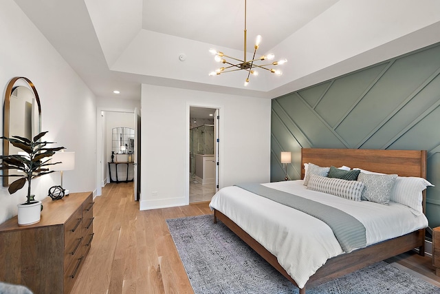 11060 Lizmore Ln Unit 27B, Orland Park, IL 60467 - bedroom with a chandelier, light wood finished floors, and baseboards