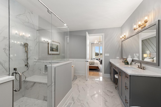 11060 Lizmore Ln Unit 27B, Orland Park, IL 60467 - full bath with ensuite bathroom, marble finish floors, a marble finish shower, double vanity, and a wainscoted wall