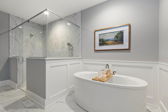11060 Lizmore Ln Unit 27B, Orland Park, IL 60467 - full bathroom featuring marble finish flooring, a decorative wall, a freestanding tub, a marble finish shower, and a wainscoted wall