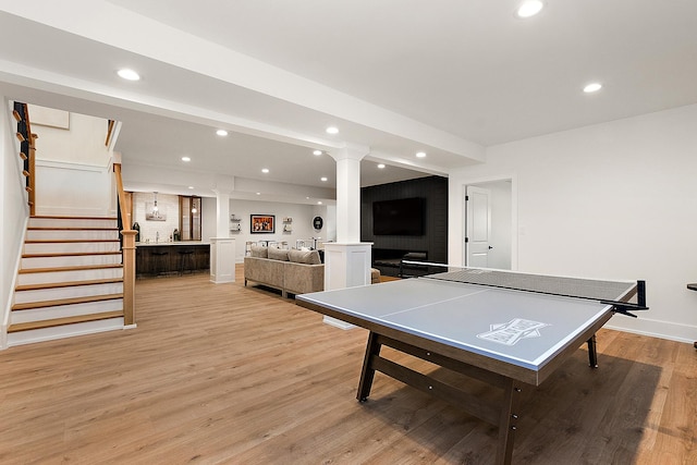 11060 Lizmore Ln Unit 27B, Orland Park, IL 60467 - recreation room with decorative columns, recessed lighting, light wood-style floors, and baseboards