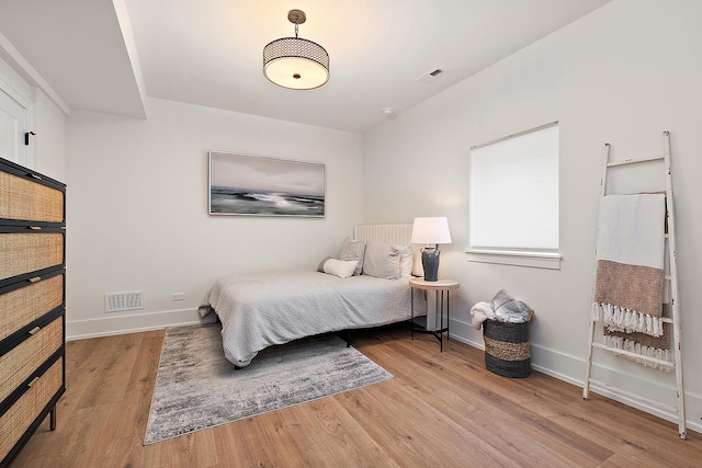11060 Lizmore Ln Unit 27B, Orland Park, IL 60467 - bedroom featuring wood finished floors and baseboards
