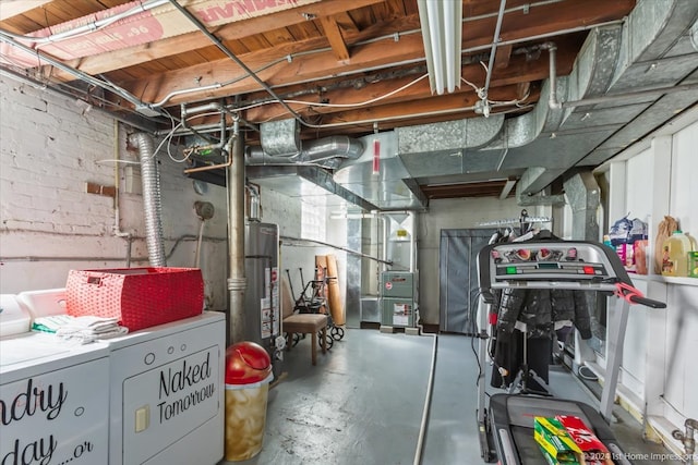 utilities featuring heating unit, independent washer and dryer, and water heater