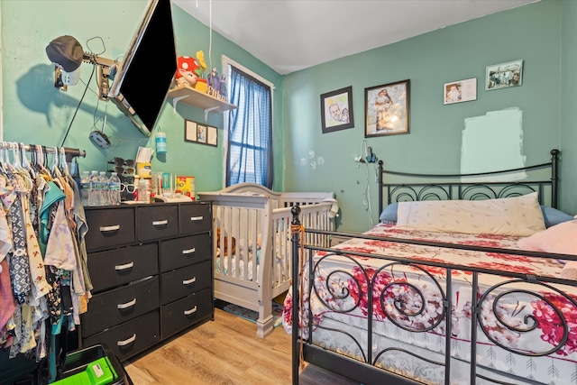 bedroom featuring light wood-type flooring