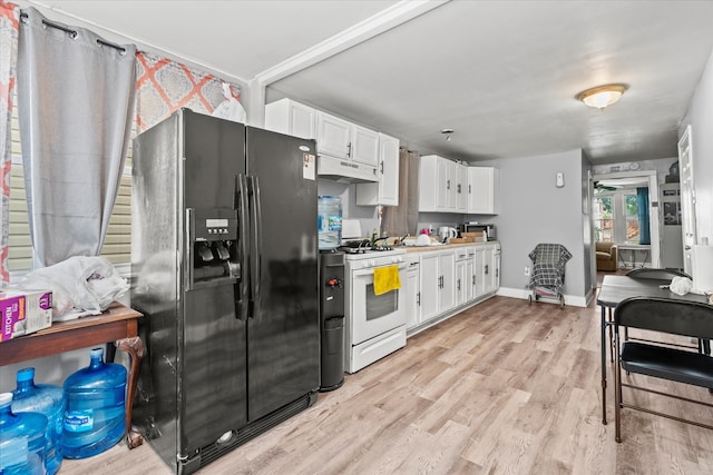 kitchen featuring light hardwood / wood-style floors, white gas range, black fridge with ice dispenser, and white cabinetry