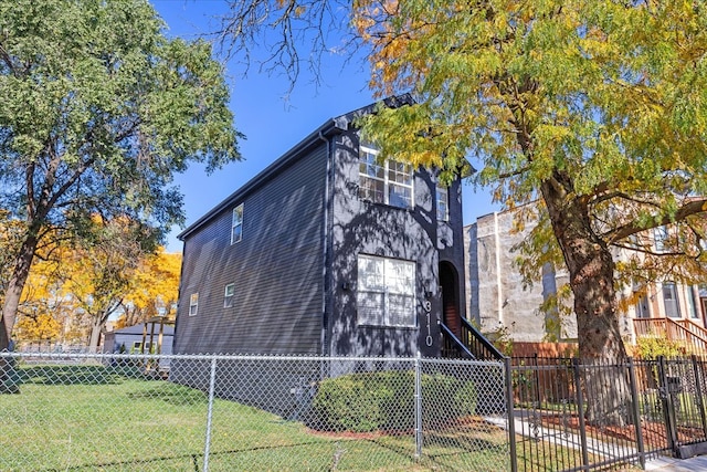 view of home's exterior featuring a lawn