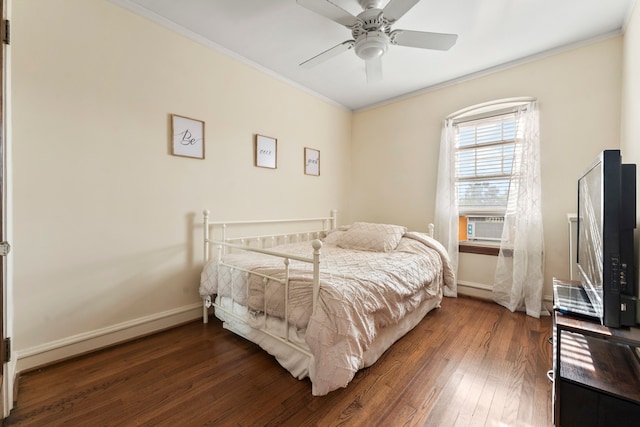 bedroom featuring crown molding, dark hardwood / wood-style floors, ceiling fan, and cooling unit