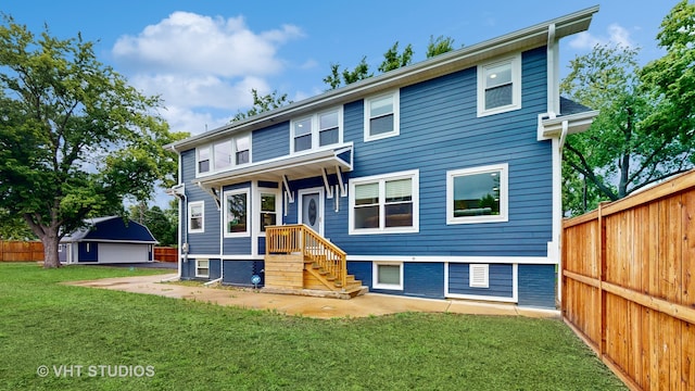 view of front of property with a front lawn