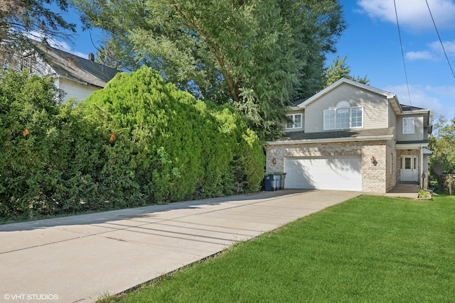 view of front of property featuring a garage and a front yard