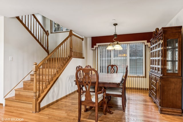 dining room with hardwood / wood-style flooring