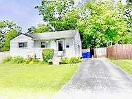 view of front of home with a front lawn