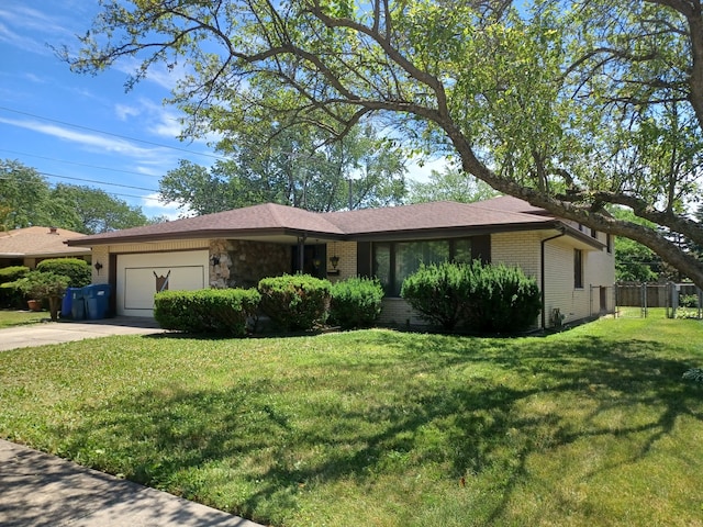 single story home featuring a front yard and a garage