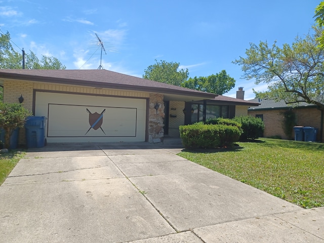 ranch-style home with a garage and a front yard